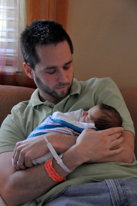 Morgan Porter holding his newborn son, Kyler Porter